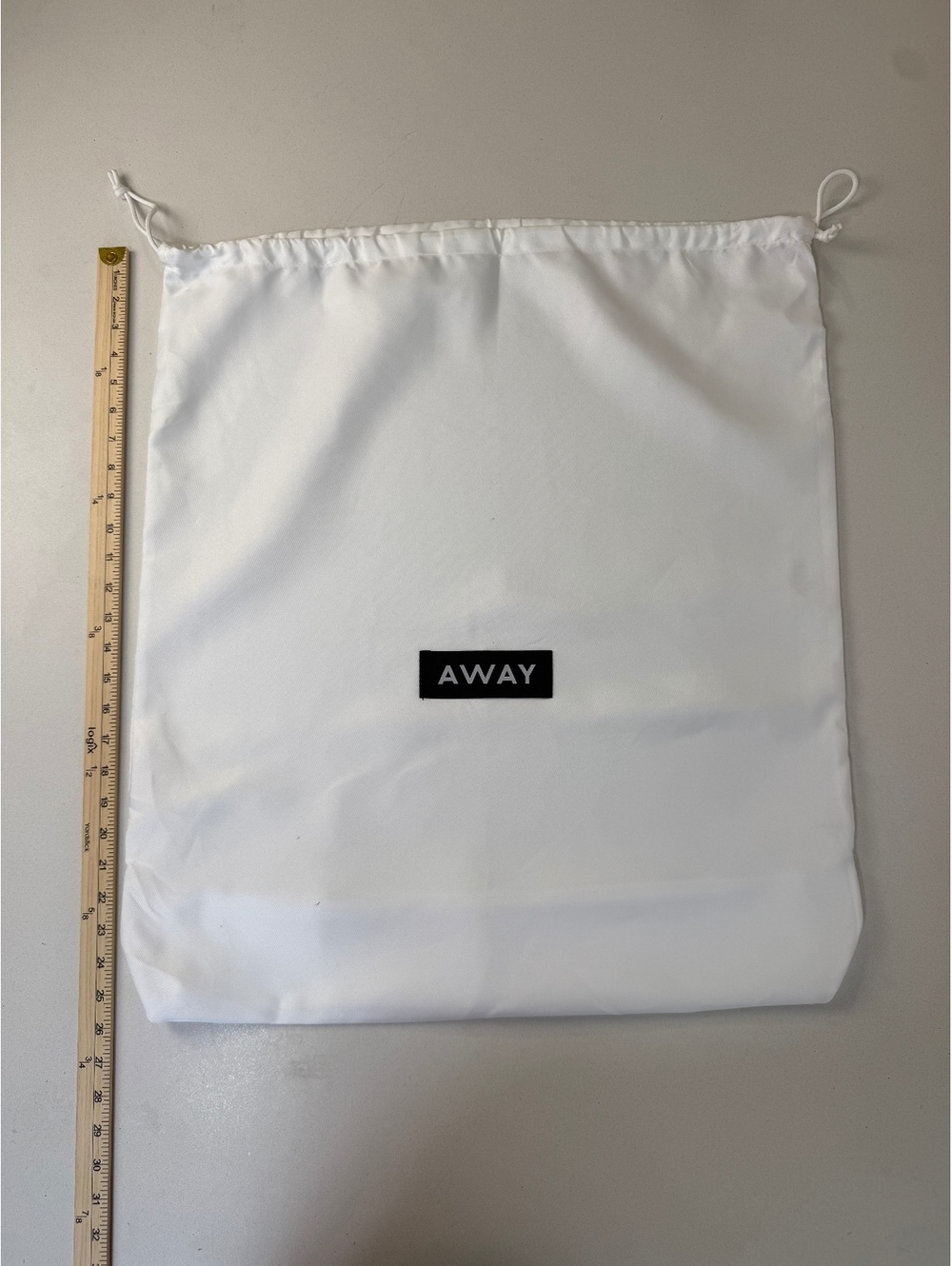 Away White Drawstring Dust Bag for Luggage